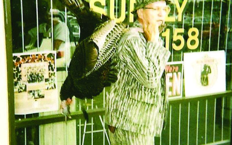 Grandaddy with a turkey at DOCS sporting goods. CONTRIBUTED
