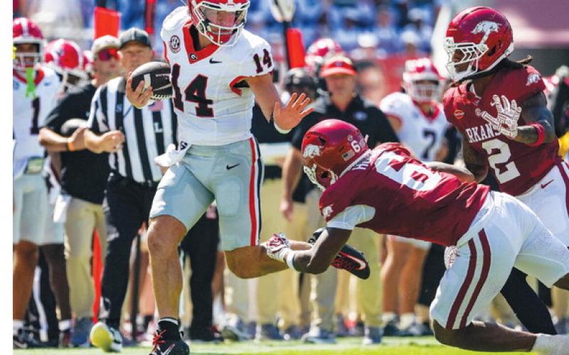 Georgia quarterback Gunner Stockton ran for 122 yards on seven attempts, including one62-yard run. He recorded 147 yards and a score through the air. COURTESY OF UGA ATHLETICS