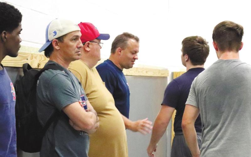 From left are Jonquil Coates, Coach Stanley, Coach Snowden, Coach Hutsell, Tristan Lower and Cooper Smallwood. ARELLA CASH/Staff