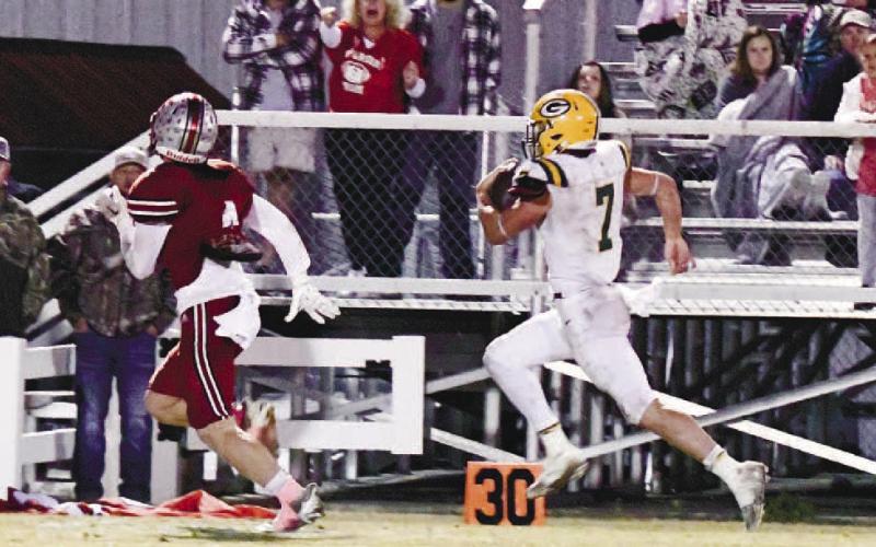 Evan Bennett (7) had a big night in Waynesboro, scoring four of five touchdowns for the Gatewood Gators in their 38-28 win over Edmund Burke Academy. DAWN SINCLAIR/Contributed