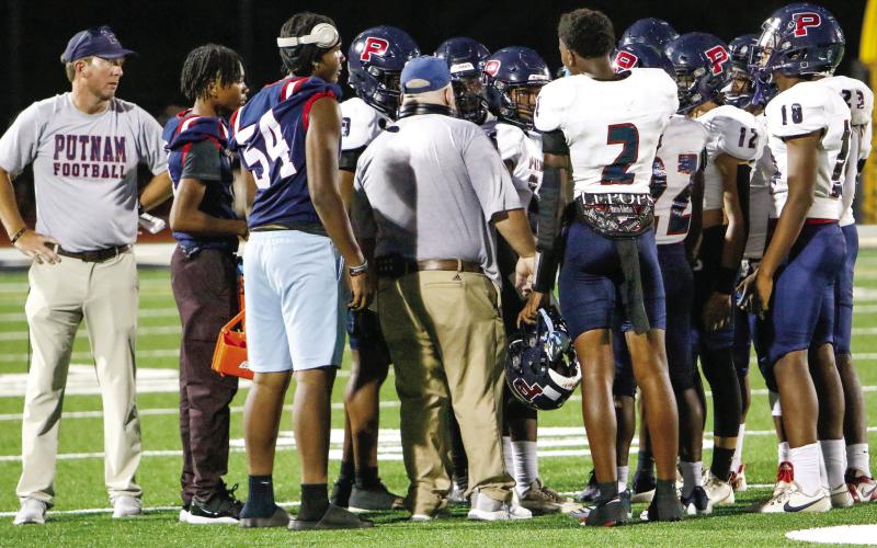The War Eagles huddle during a timeout in a game earlier this season against Greene County. (LANCE MCCURLEY/Staff)