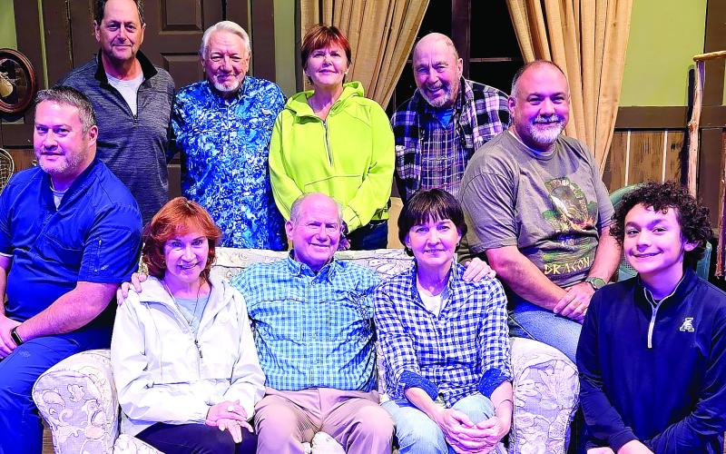The cast of On Golden Pond at The Plaza includes (standing l-r): Lou Benjamin, Dennis McClain, Robin Cassidy, and Pete Stephan, with (sitting l-r): Andrew Tam, Sarah Daily-Weir, Bill Dudley, Jackie Hill, Brent Mero, and Luis Quinones. CONTRIBUTED