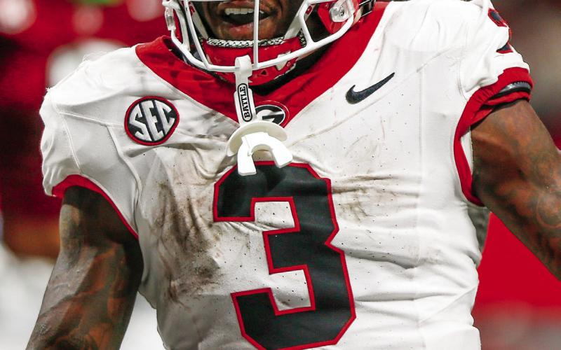 Georgia running back Nate Frazier (3) rushed for a team-high 52 yards on 13 carries and a touchdown against Alabama. LANCE McCURLEY/Staff