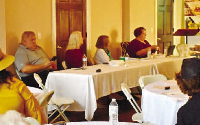 Current and prospective business owners listen to Tim Broyles’ presentation. LENA HENSLEY/Staff