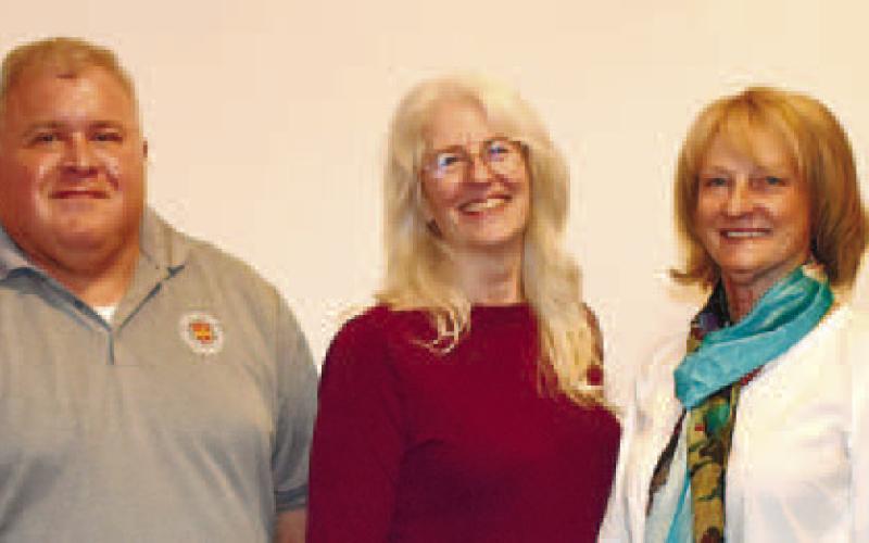 L-R: Michael Homeier, Main Street Advisory Board member; Dr. Marshall Rich, CEO of Rich on Cyber, Jenny Watt, the founder of Creatively Techy; Bonnie Kallenberg, owner of Finders Keepers; and Lauren Singleton, manager of Eatonton Main Street. LENA HENSLEY/Staff