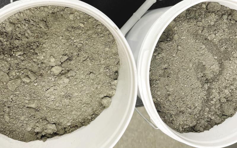 Source of the controversy: two buckets of coal ash at the soon-to-beactivated Plant Branch facility for treating coal ash and transforming it into a concretehardening agent. COURTESY GEORGIA POWER
