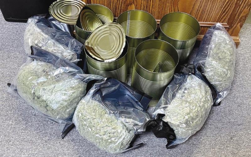 Local authorities intercepted a FedEx package containing medical grade marijuana sent to Eatonton from California last week. Two men were arrested. CONTRIBUTED/PCSO