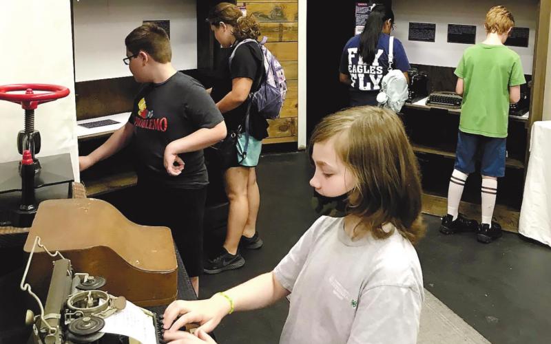 Campers explore the Georgia Writers Museum. GRAYSON HUSKIN/Contributed