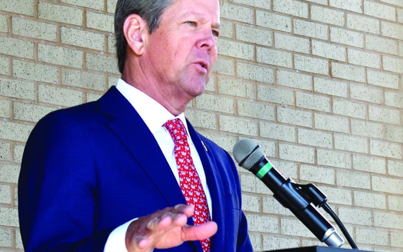 Georgia Gov. Brian Kemp speaks on the sacrifice of veterans and their need for care. BAILEY BALLARD/Staff