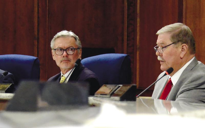 L-R: Putnam County Commissioners Alan Foster, Daniel Brown, Gary McElhenney and Board Chairman Bill Sharp listened for approximately two hours as citizens expressed opinions on short-term rentals last Thursday night. IAN TOCHER/Staff
