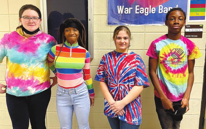 Eighth graders Samantha James, Jazmin Thrash, Emma Bloodworth and Bill Waters show off their appreciation for neurodiversity through rainbow and tie-dye. ANNIE BOLLEN/Contributed