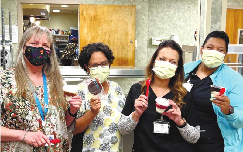 Staff members enjoy a sweet treat provided by Eatonton Dairy Queen. CONTRIBUTED