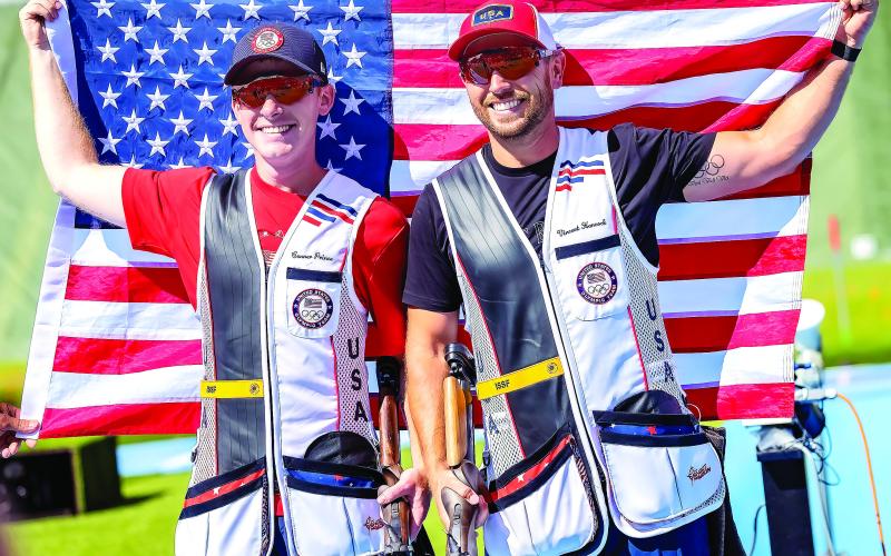 Conner Prince (left) and former Gatewood Gator Vincent Hancock celebrate their one-two finish in men’s skeet shooting at the Paris Olympics. The win made Hancock just the sixth Olympic athlete in history to win the same individual event four times. Courtesy USA Shooting