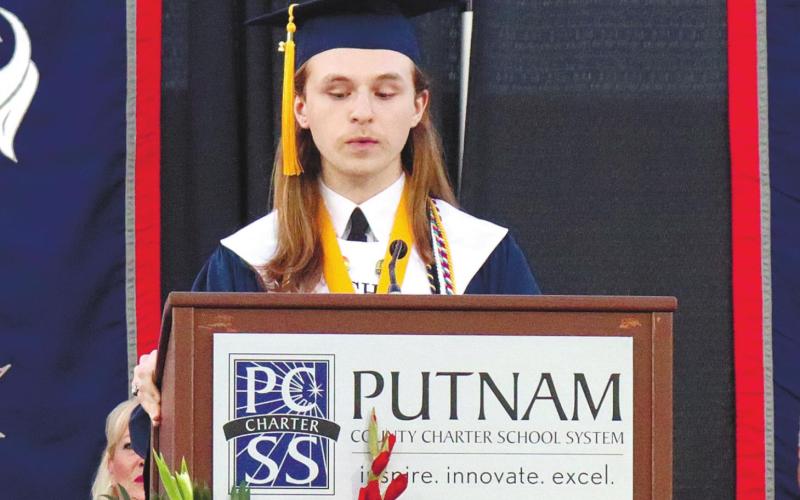 Tyler Wallace, valedictorian of the class of 2022, gives his speech to the class.