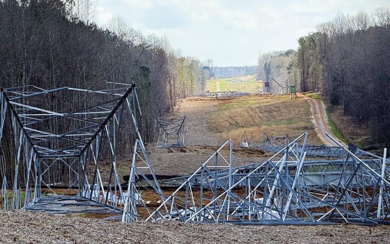 Within Putnam County, the Georgia Transmission project will include a series of large, lattice-style, steel structures, each standing between 100 and 150 feet tall and spaced about 1,200 feet apart. Overall, 203 structures are planned for the full 46.5-mile route across three counties, with many already in place, awaiting assembly. IAN TOCHER/Staff