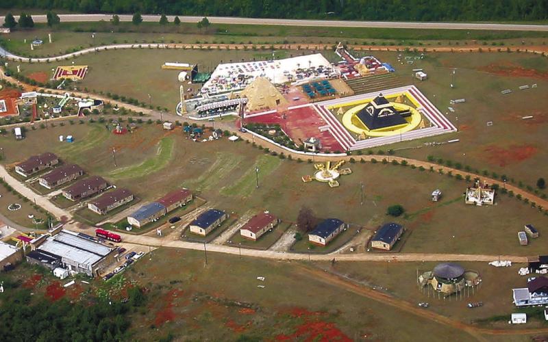 At its height in the late 1990s, the Nuwaubian Nation complex covered about 19 acres alongside Putnam County’s Shady Dale Road (top). CONTRIBUTED