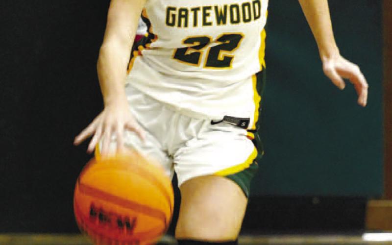 Anna Williamson (22) brings the ball up the court. CONTRIBUTED