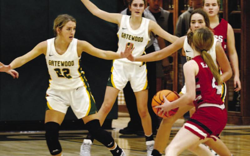 The Lady Gators sit back in a zone defense in a game earlier this season against YACS.