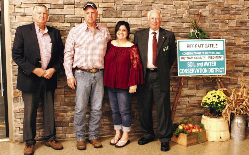 Shawn Raff (second from left) of Riff Raff Cattle was named Putnam County’s Conservationist of the Year by NRCS and the Piedmont Soil and Water Conservation District. CONTRIBUTED