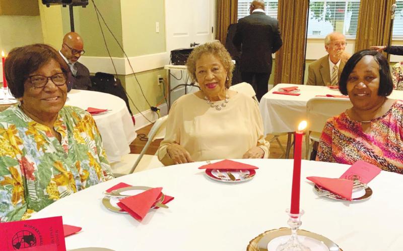 Fannie Hill, Leila Williams, and Sheila Bustion, all classmates of Georgia Smith, attend the dinner. LYNN HOBBS/Staff
