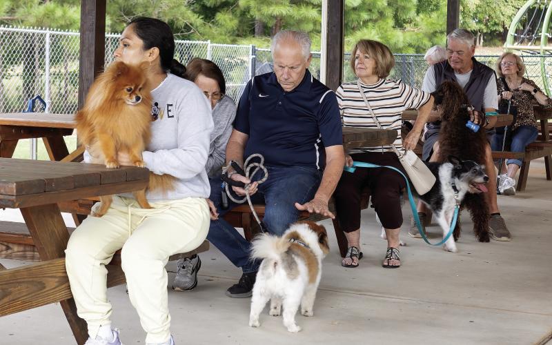 Pets and their people gather Friday for the annual Blessing of the Animals at Christ Our King and Savior Catholic Church in Greensboro. LEIGH LOFGREN/Staff