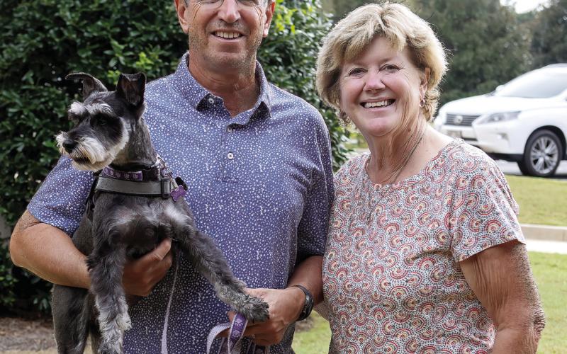 Scott and Mary Gessay with Nellie after the blessing. LEIGH LOFGREN/Staff