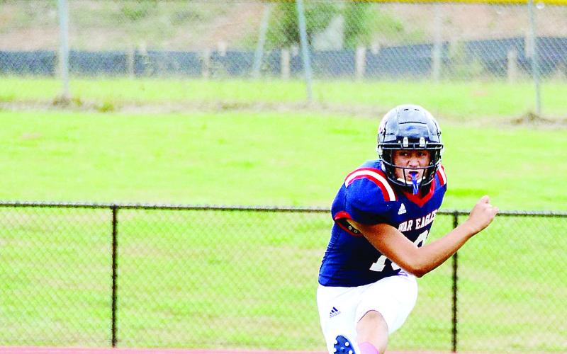 Putnam County’s Alex Jimenez booms a kick downfield against Social Circle. IAN TOCHER/Staff