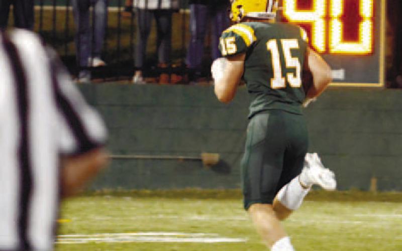 Lawson Wooten (15) recovered a CFCA fumble late in the third quarter and ran the ball back for the Gators’ last touchdown.