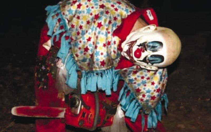 FAFO the clown creeps through the dark with his chainsaw after being infected by the joyful madness. CONTRIBUTED