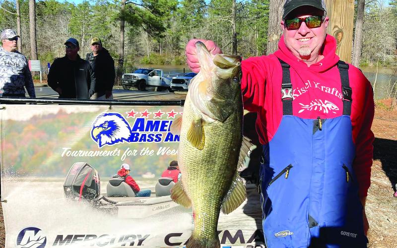 Aaron Batson with a hawg from Sinclair in the cold muddy water. CONTRIBUTED