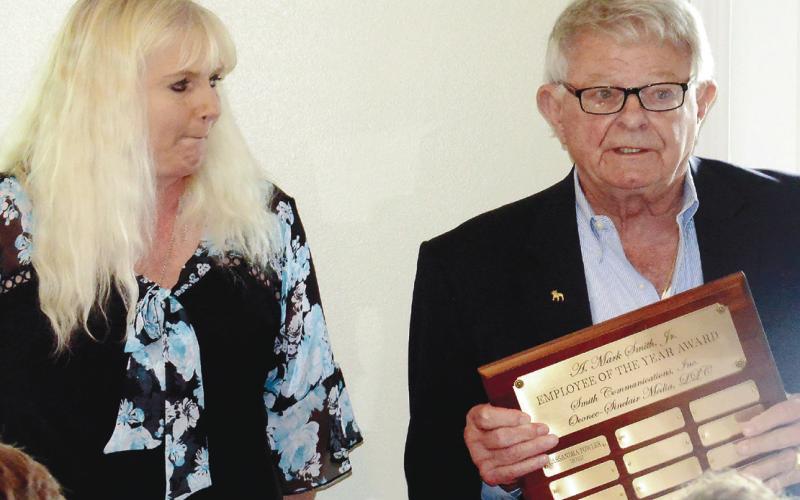 Smith Communications Business Manager Cassandra Fowler is announced as the 2022 Employee of the Year by President and CEO A. Mark Smith Sr. IAN TOCHER/Staff