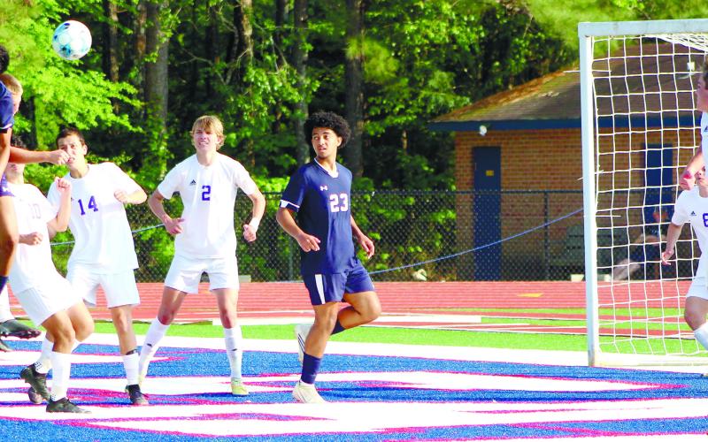War Eagle Brad Reeves (5) sends a header in the air toward the Union County goal. ARELLA CASH/Staff