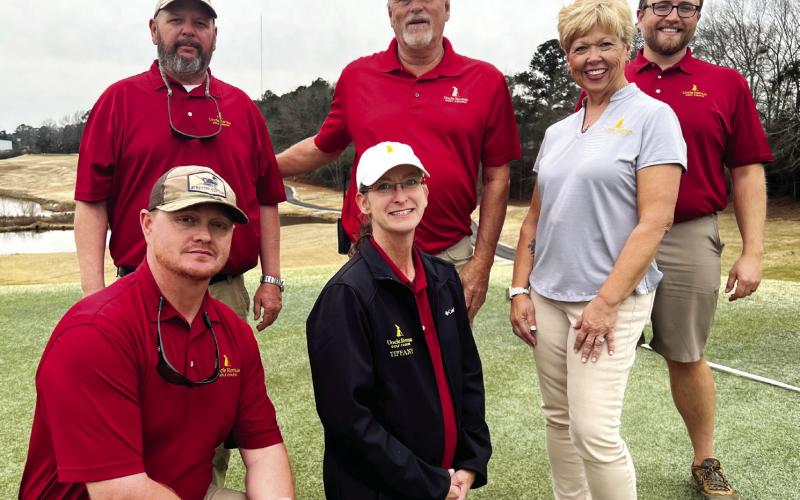 The staff at Uncle Remus Golf Course, including Garrett Few and Tiffany Mangham (front row) and (l-r) Jason Kimbrough, Pat Holder, Diane Carter, and course manager Michael Benton, are all determined to deliver a top-notch experience to golfers March 2 during the inaugural Leadership Putnam Class of 2023-24 Golf Tournament. IAN TOCHER/Staff