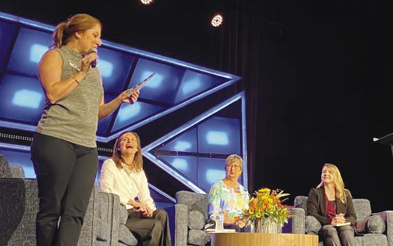 Georgia Writers Museum Executive Director Melissa Swindell (standing) was joined onstage by (l-r) Tara Rocker, Betty Liedtke and Kim Conrey in discussing the museum’s various roles within the local women’s community. EMME CLAUSE/Staff