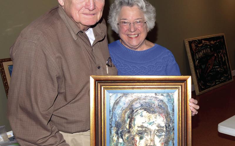 Steffen Thomas art curator Andrew Hayes and his wife, Hathia, spent several days early this month carefully sorting, measuring, and placing art in preparation for the Steffen Thomas Museum’s new exhibit.