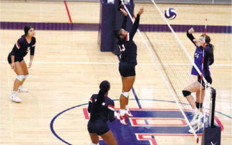 Tytianna Little with strong net play against Piedmont Academy.