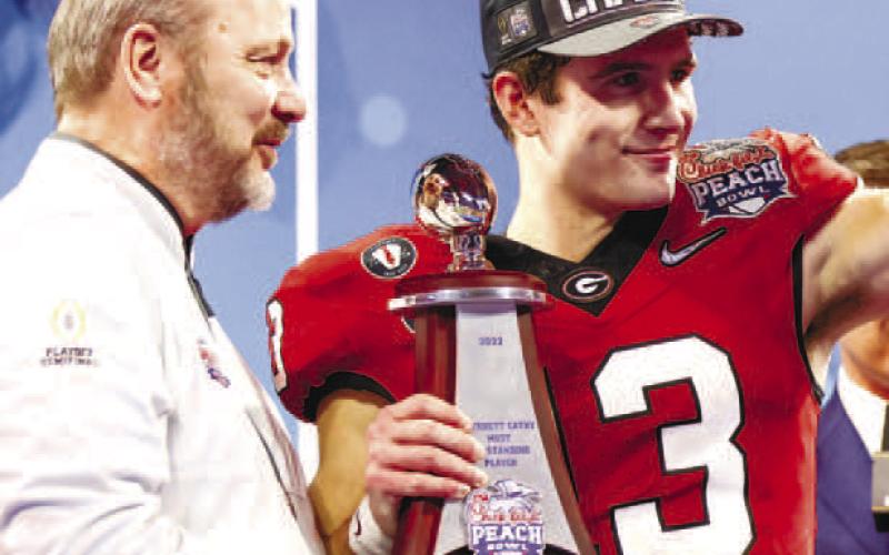 Georgia quarterback Stetson Bennett (13) was resilient after a tough start against Ohio State. On Georgia’s last two drives of the game, Bennett completed 5-of-5 passes for 148 yards and two TDs. He also passed for 190 yards in the fourth quarter. TONY WALSH/UGA Athletics