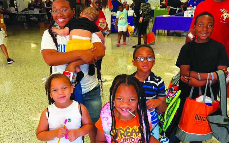 Happy families enjoyed the Reach 2 Teach Back-to-School Bash and Community Health Fair, held last Saturday at Putnam County Elementary School. CONTRIBUTED