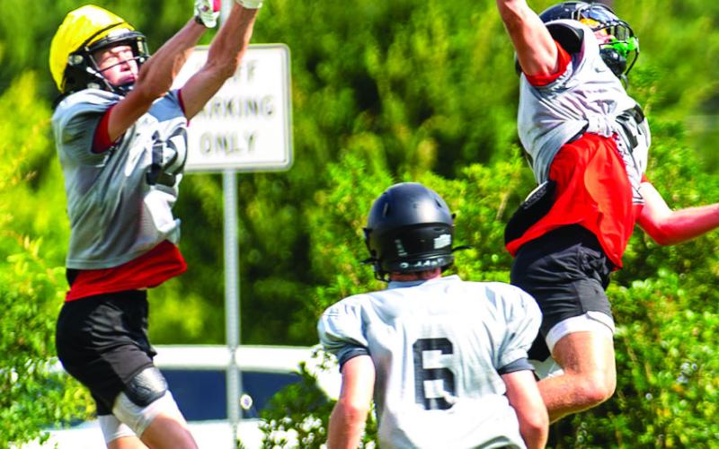 Wide receiver Cole Wesley makes an athletic catch at a recent practice. He’s expected to play a major role for Morgan County on offense this season. SKYLA MORRIS/Staff
