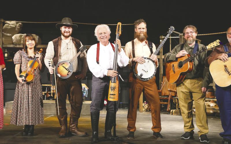 The great and talented musicians. From left to right: Donna Valvo, music director; Keiko Ishibashi, violin/fiddle; John Cooper, violin/mandolin/fiddle; Tom Shalin, instrumental director/fretless and electric bass; Tom Baker, banjo; Brian Smith, acoustic guitar; and Skip Taylor, acoustic guitar. Photos by LEIGH LOFGREN/Staff