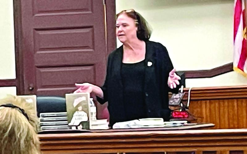 Author Ann Hite talks about and shows findings from the research behind her new nonfiction book. LYNN HOBBS/Staff
