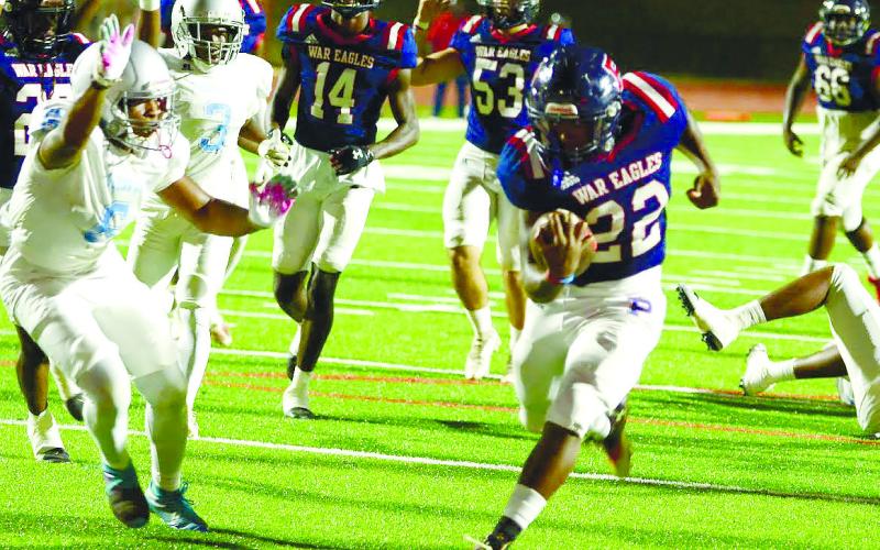 War Eagle sophomore Omarion Butts (22) rushed for two touchdowns in Friday’s win over Glenn Hills. IAN TOCHER/Staff