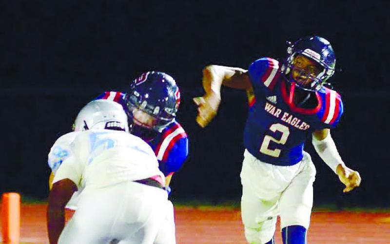 Junior quarterback Jamarion Butts completed 4-of-5 passes for 50 yards and a touchdown in Friday’s win over Glenn Hills. IAN TOCHER/Staff
