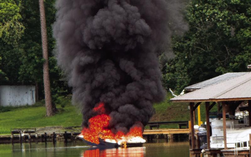 A boat adrift on Lake Sinclair is fully engulfed Friday morning before Putnam County firefighters arrive. CONTRIBUTED