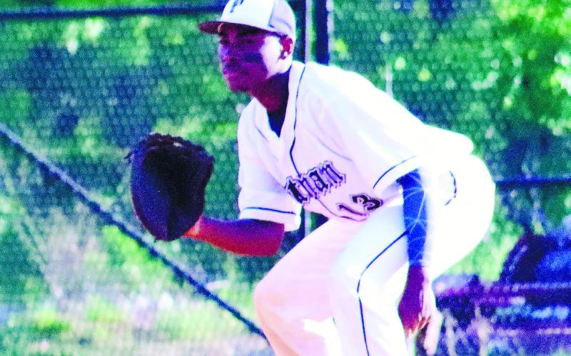 BJ Ruff (13) gets set to make a play on the bag in a game last season. FILE PHOTO