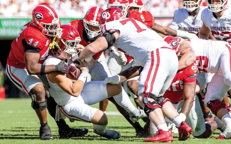 Georgia’s swarming defense made life difficult for Oklahoma quarterback John Mateer. SKYLA MORRIS/Staff