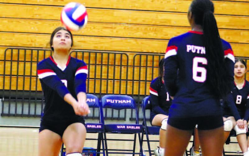 Leslye Arriola (9) with dig in region match vs Laney.