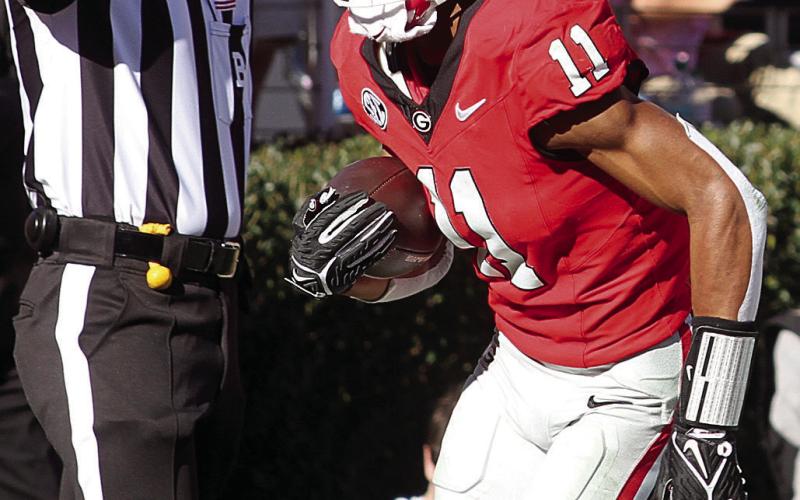 Georgia wide receiver Arian Smith (11) led the team in receiving yards at 110 on three catches with one touchdown. BRAD HARRISON/Staff
