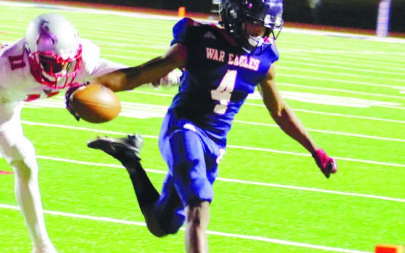 DJ Bland (4) takes a 3-yard jet sweep toward the corner of the end zone. ARELLA CASH/Staff