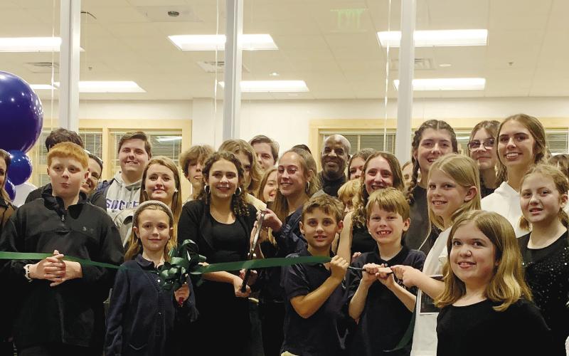 Students cut the ribbon to the new fine arts building at Lake Oconee Academy in Greene County. CONTRIBUTED